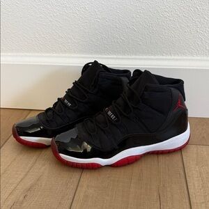 Air Jordan 11 Bred Lids Sneakers Black with Red Soles